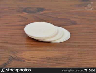 Paper wafers on wood
