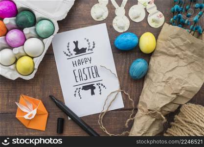 paper with title near set easter eggs willow twigs origami rabbit