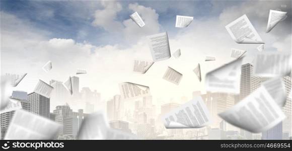 Paperwork. background image with papers flying in air