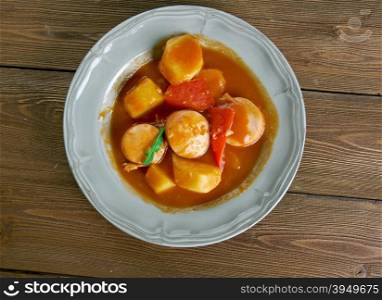 paprikash krumpli - Hungarian Paprika Potatoes . stew made of potato, onion, pepper, tomato, sausage