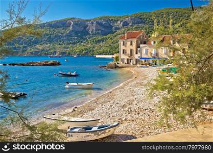 Paradise beach in Komiza adriatic village on Vis island, Dalmatia, Croatia