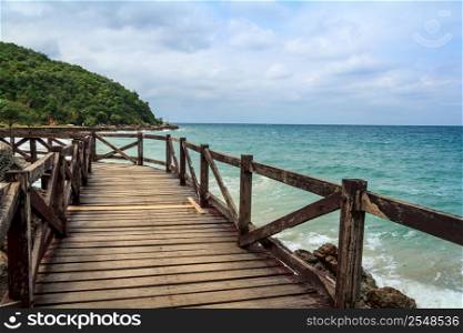 Paradise Beach With Wooden Bridge At Island