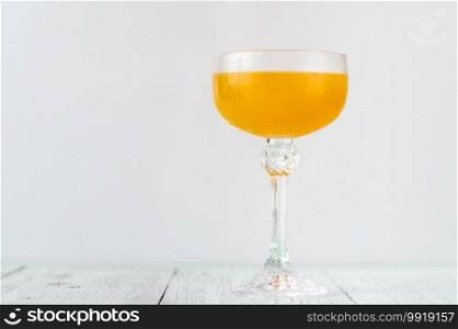 Paradise cocktail prepared using gin, apricot brandy and orange juice