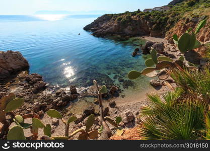 Paradise sea bay with azure water and beach. View from coastline trail of Zingaro Nature Reserve Park, between San Vito lo Capo and Scopello, Trapani province, Sicily, Italy