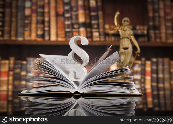 Paragraph and Law books, justice concept, Courtroom. Gavel of a judge in court