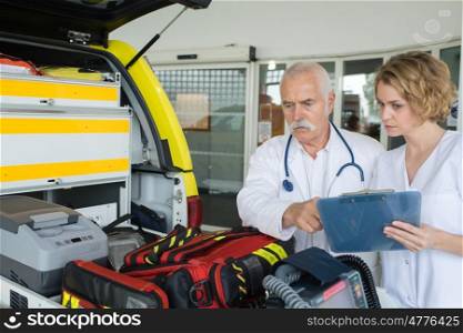 paramedics preparing ambulance