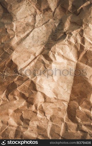 Parcel paper as background texture. Recycling concept and brown paper heap