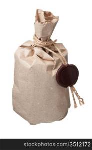 parcel wrapped with brown kraft paper with a wax seal isolated on white background