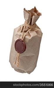 parcel wrapped with brown kraft paper with a wax seal isolated on white background