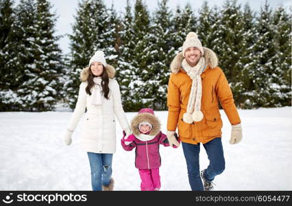 parenthood, fashion, season and people concept - happy family with child in winter clothes walking outdoors