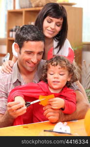 parents and child preparing for Halloween