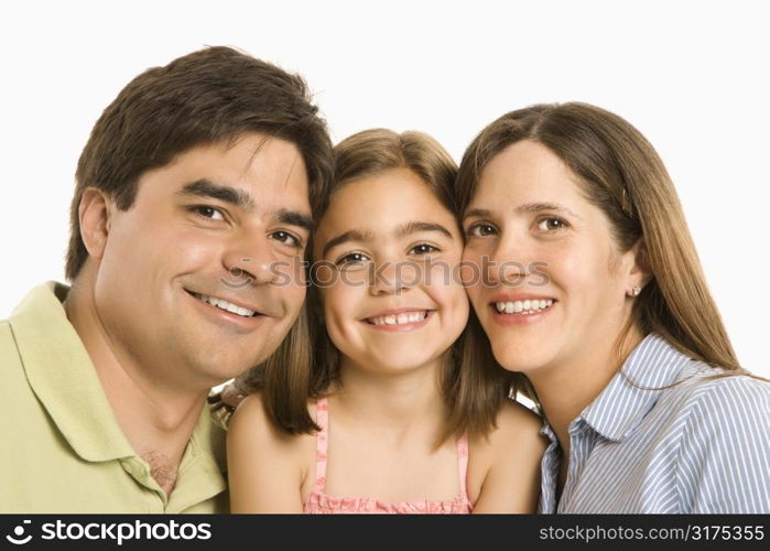 Parents and daughter smiling against white background.