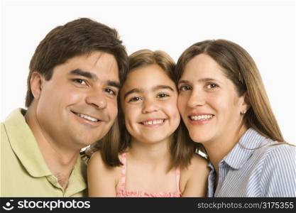 Parents and daughter smiling against white background.