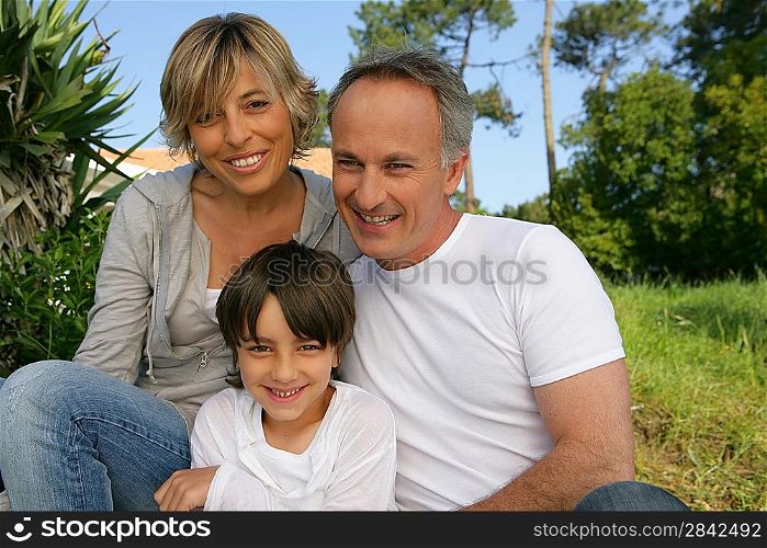 Parents and son in the garden