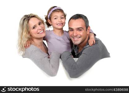 parents and their little girl on the couch