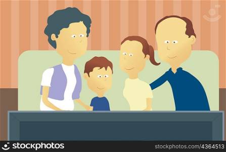 Parents and their two children watching television