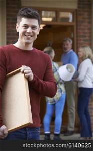Parents Helping Adult Son To Move Into Home