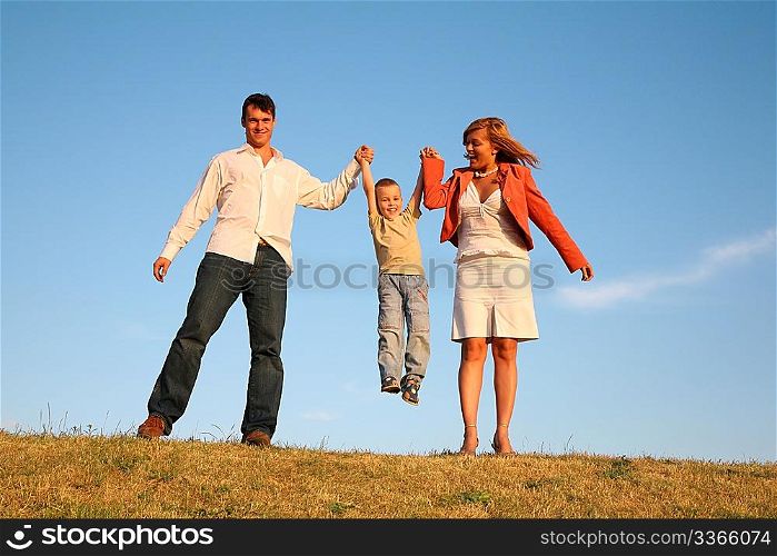 parents hold the child