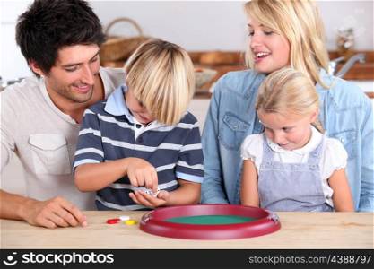 Parents playing with children