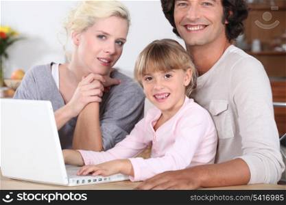 Parents teaching their child computer skills