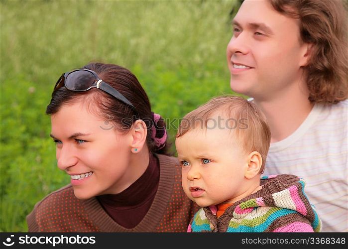Parents with child on nature