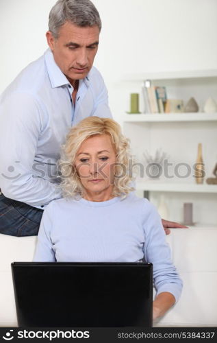 Parents with laptop