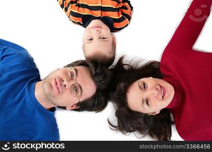 Parents with son lying top view