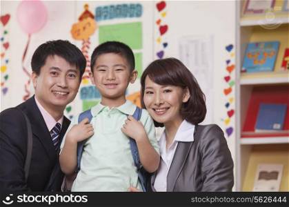 Parents with their Son in Classroom