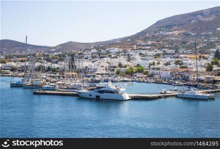 Parikia, Greece - September 02, 2017: Parikia town and marina with yachts and boats , view from the sea, Paros island, Cyclades, Greece