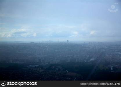 Paris aerial view on foggy day with Eiffel tower at background