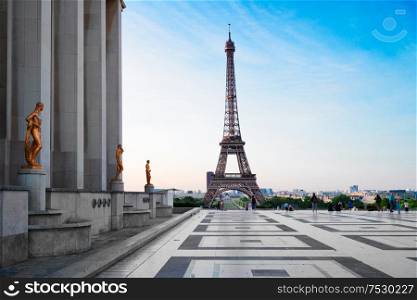 Paris Eiffel Tower and Trocadero square at sunset in Paris, France. Eiffel Tower is one of the most iconic landmarks of Paris.. eiffel tour and from Trocadero, Paris