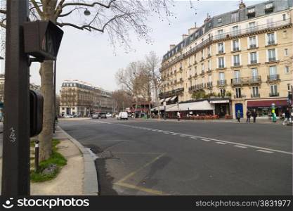 PARIS, FRANCE - MARCH 13: Tourists walk past a cafeteria and souvenir store on March 13, 2015 in Paris. Paris is the most visited city in the world.