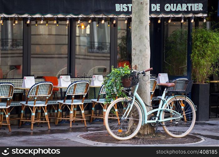 PARIS, FRANCE - MARCH 28, 2018: beautiful views of the streets of paris and cafe. Paris, France