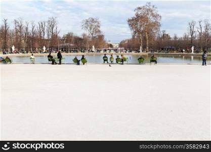 PARIS, FRANCE - MARCH 5: Grand Basin Octagonal in Tuileries Garden. In 1664 landscape architect Andre Le Notre redesigned garden and placed basins with fountains, in Paris, France on March 5, 2013