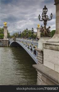 PARIS, FRANCE - MAY 15, 2016: The Pont Alexandre III is a deck arch bridge that spans the Seine in Paris
