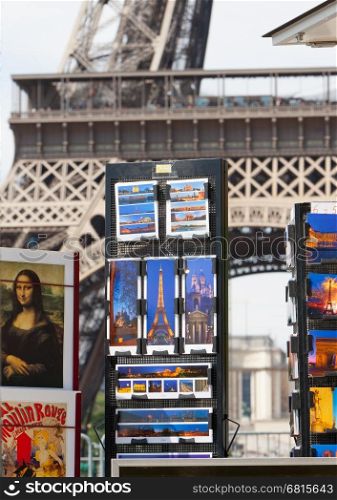 PARIS - JULY 27: Postcard stand at the Eiffel Tower on July 27, 2013, in Paris. The Eiffel Tower is the most visited tourist attraction in France and one of the most recognizable landmarks in the world.