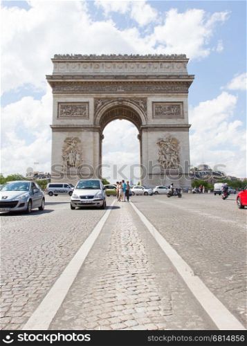 PARIS - JULY 28: Arc de triomphe on July 28, 2013 in Place du Carrousel, Paris, France. The monument to Napoleonic victory is a tourist attraction near the Louvre, Paris, 28 July 2013