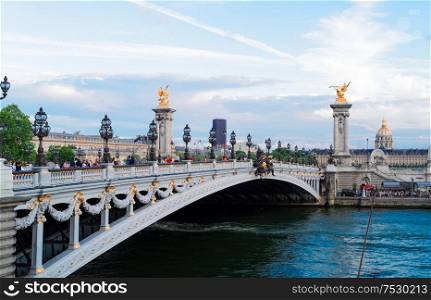 Paris landmark - famouse Alexandre III Bridge at blue dusk, Paris, France. Bridge of Alexandre III, Paris, France