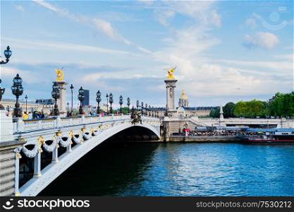 Paris landmark - famouse Alexandre III Bridge over Seine at blue dusk, Paris, France. Bridge of Alexandre III, Paris, France