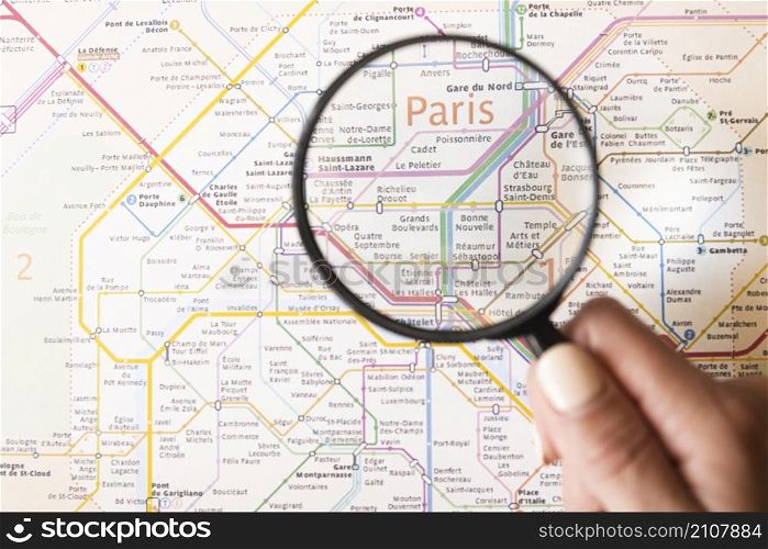 paris metro map with magnifying glass