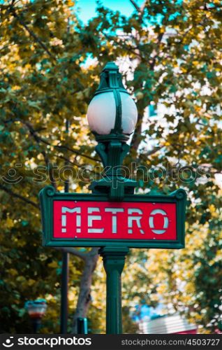 Paris metro sign on bright day