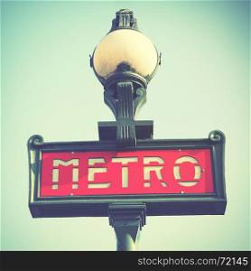 Paris metro sign. Toned image
