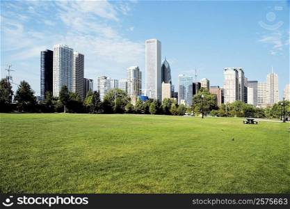Park in front of skyscrapers in a city, Chicago, Illinois, USA