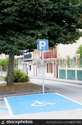 Parking for disabled people in a street of a village