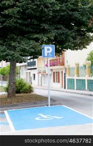 Parking for disabled people in a street of a village