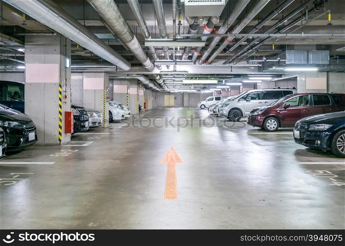 Parking garage underground, interior shopping mall at night