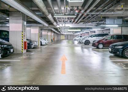 Parking garage underground, interior shopping mall at night