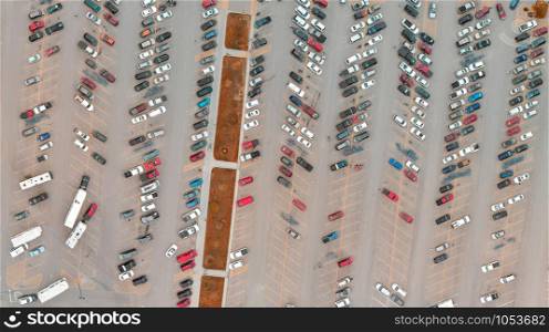 Parking lots full of vehicles. Birds eye panoramic view.
