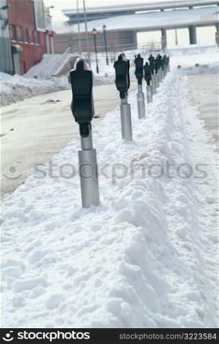 Parking Meters in the Snow