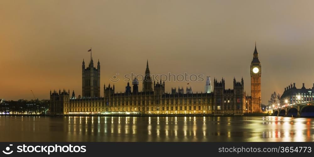 Parliament building with Big Ben panorama in London, UK in the night